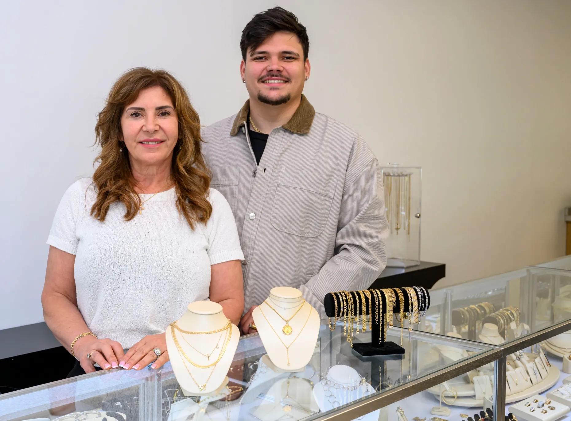 The mother-and-son team of Whitehall Coin and Jewelry behind their jewelry case
