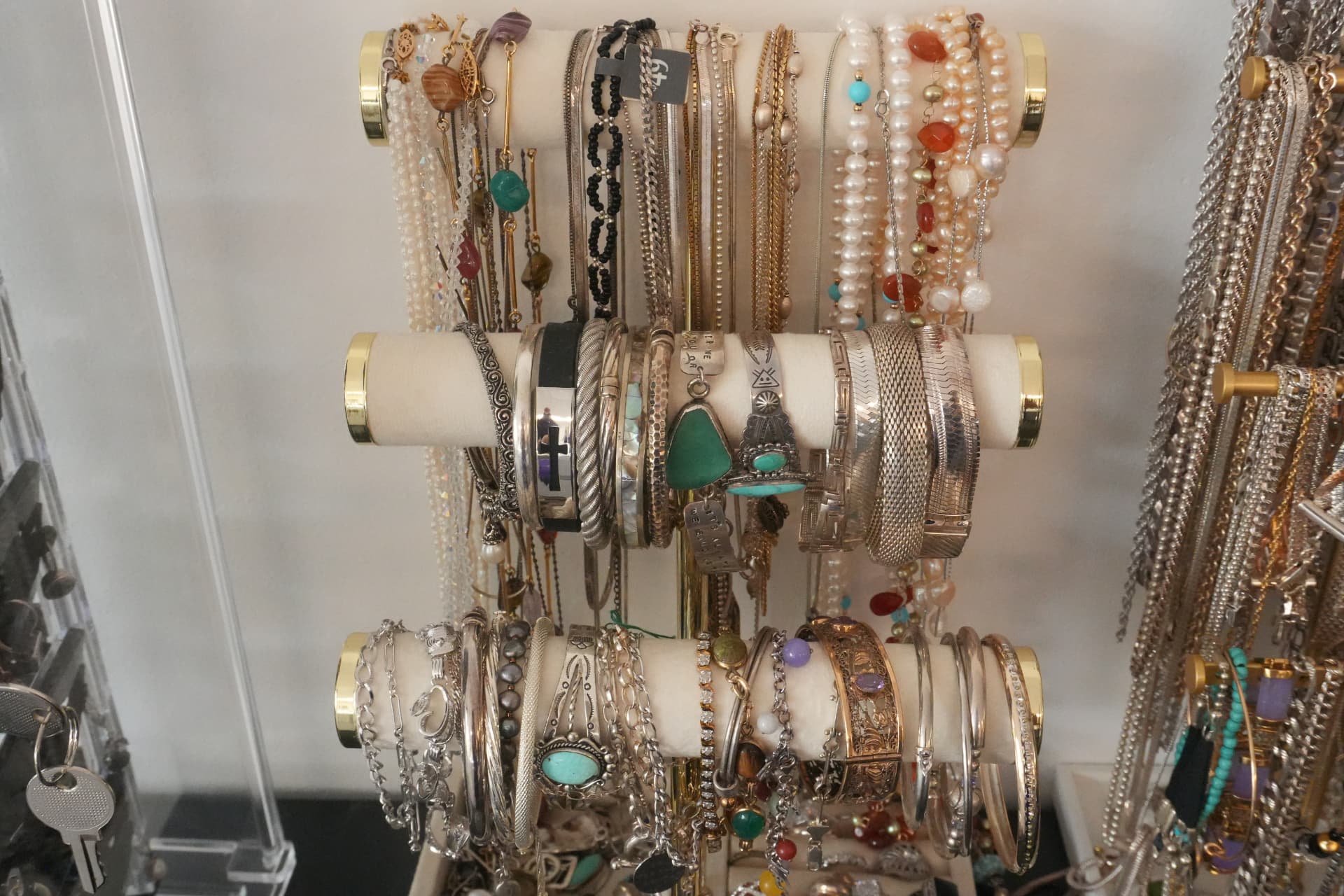 Rolling racks of pearl, turquoise and sterling silver bracelets and bangles